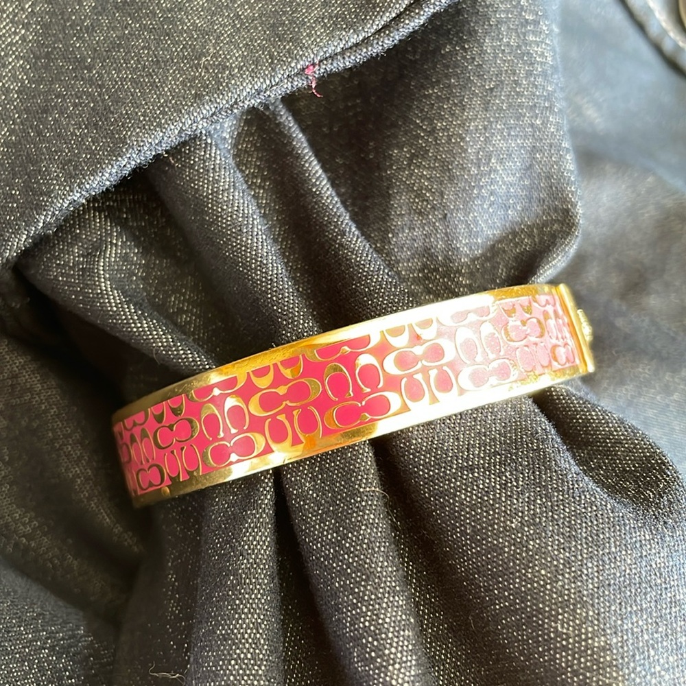 Coach logo, pink and gold logo bracelet